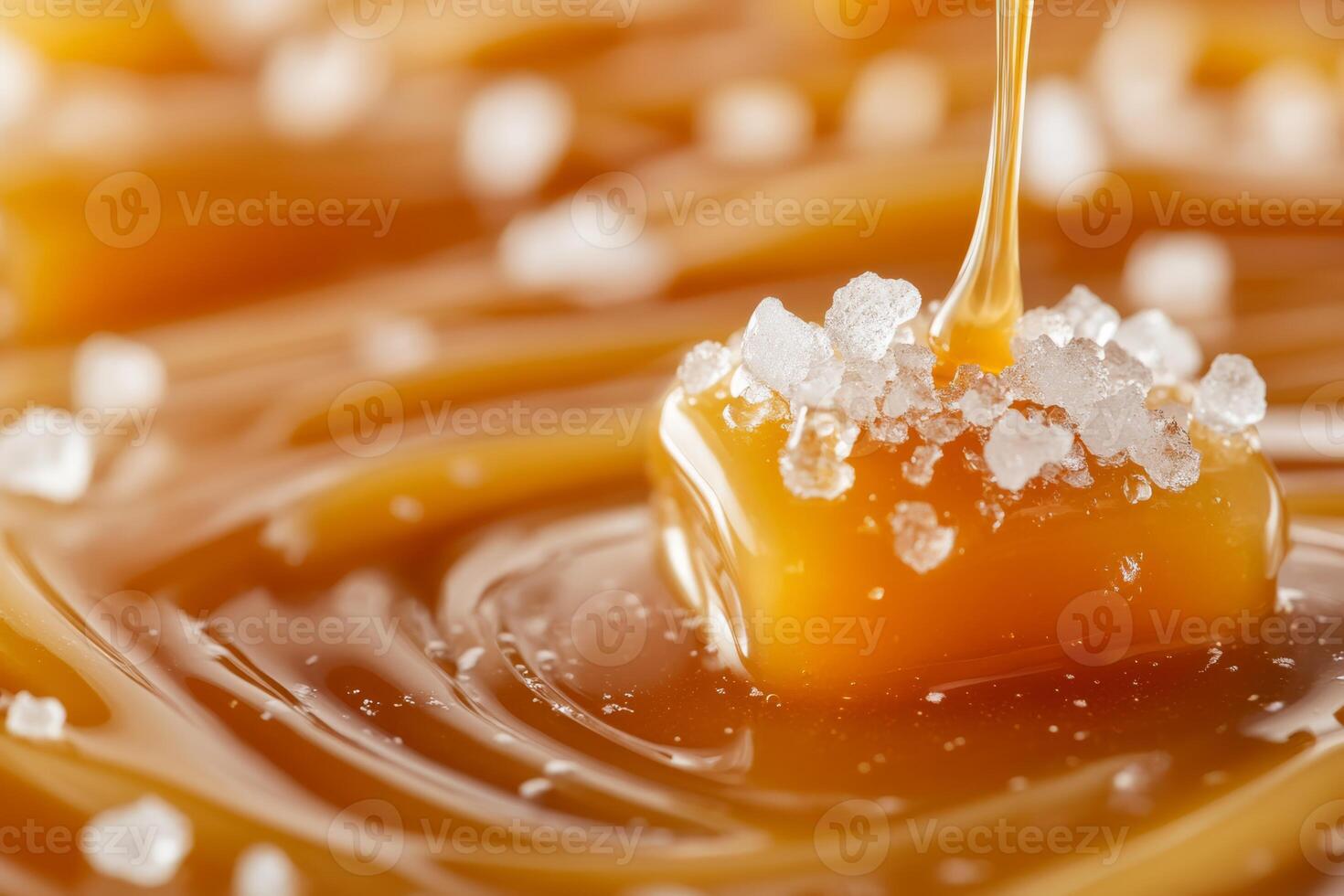 Indulge in a wonderfully rich salted caramel cube, beautifully drizzled with warm, luscious sauce and topped with sparkling crystal salta truly perfect treat for all dessert lovers out there photo