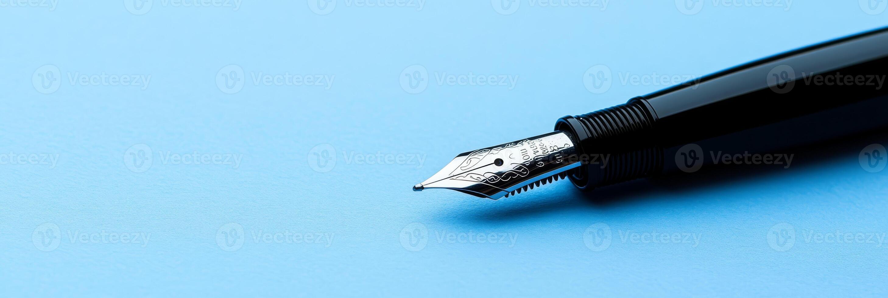 Embrace brainstorming and planning with a classic fountain pen on vibrant blue paper, perfect for igniting creativity and inspiration in your projects, helping you unleash your imaginative potential photo