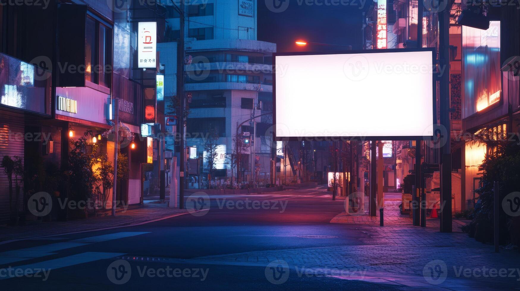 In a quiet city alley at night, a towering blank billboard stands out amid vibrant lights from nearby buildings, creating an ideal canvas for imaginative urban advertising ideas to flourish photo