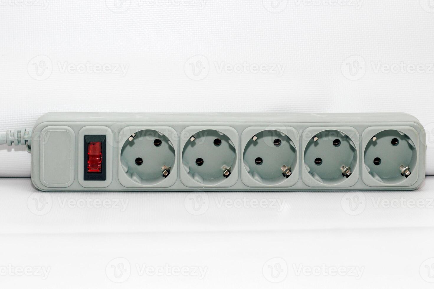 Carry extension cord with sockets. Wire for convenience in everyday life. photo