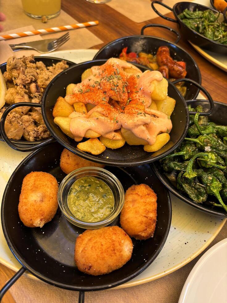 Various delicious spanish tapas photo