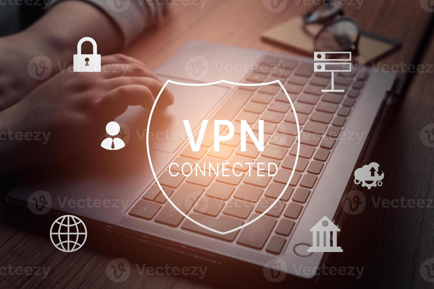 Woman hand using laptop with vpn icon on VR screen. VPN Virtual Private network protocol concept. VPN concept. photo