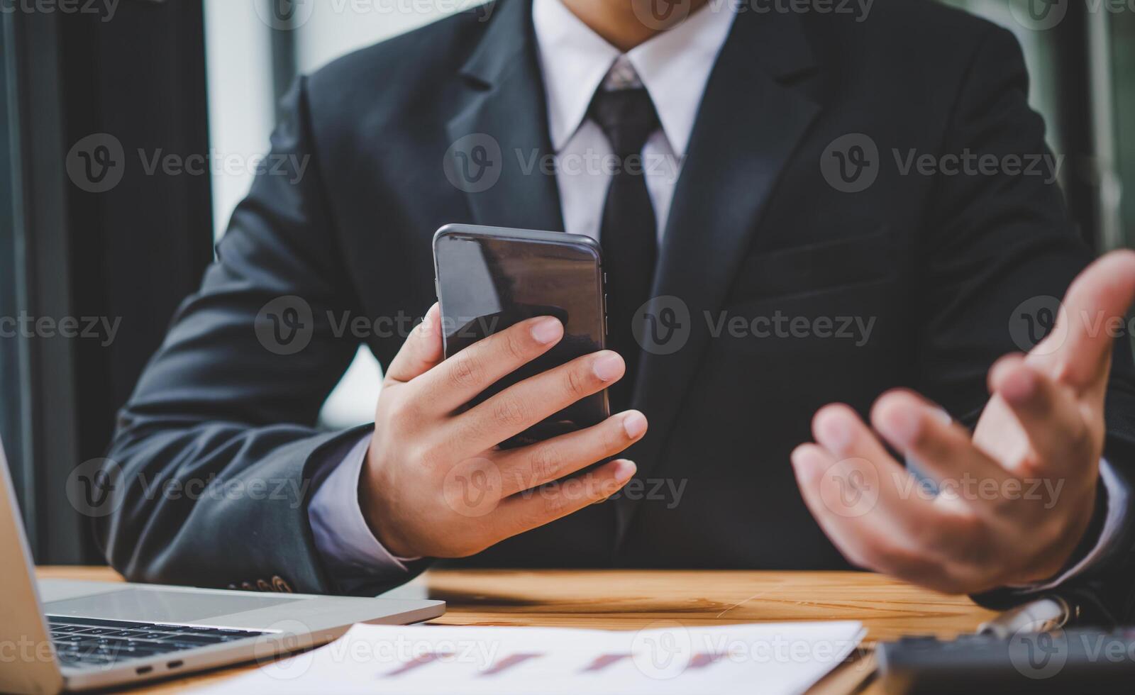 businessman pointing with pen on business report chart are working on accounts in business analysis with graphs and documentation. photo