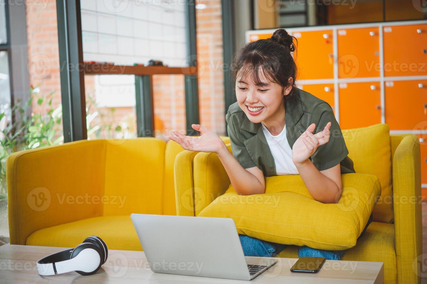 Teenage Asian are communicating through conferencing for online learning. In a conference call via apps. new normal concept photo