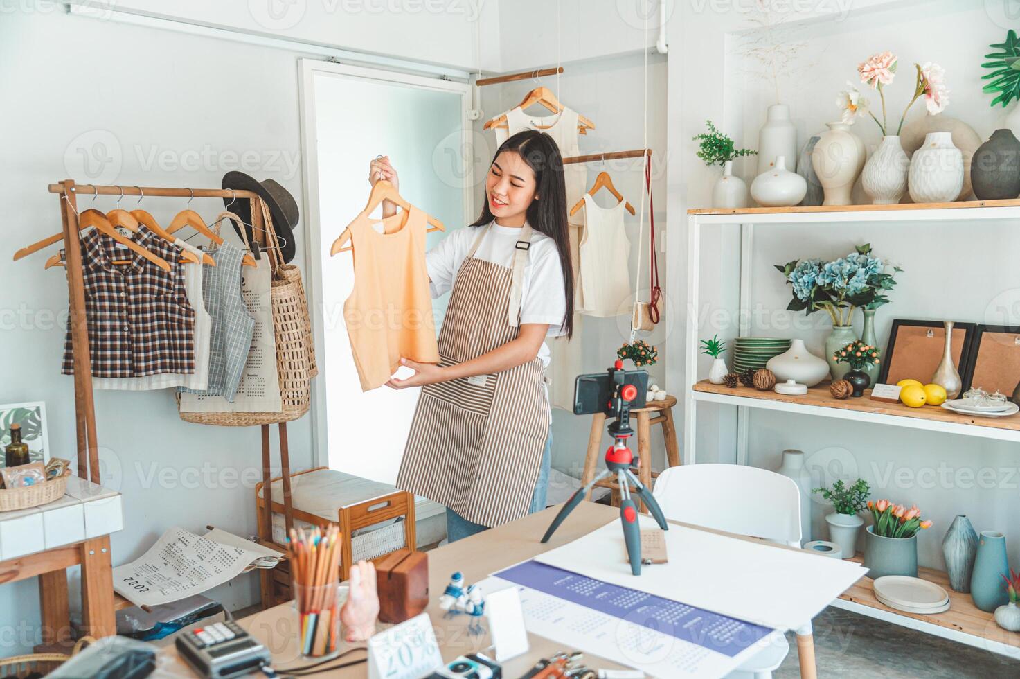 Small business owners are live streaming. Sell products to customers who come to see to buy and take orders. Check out the orders that customers order from online retailers - online shopping. photo