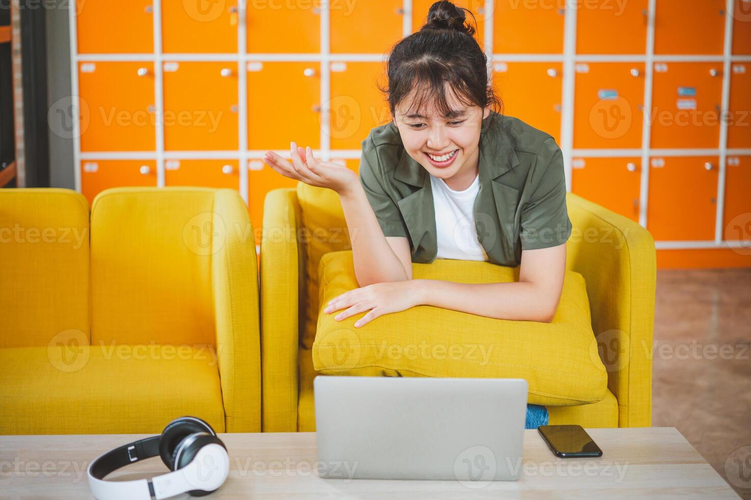 Teenage Asian are communicating through conferencing for online learning. In a conference call via apps. new normal concept photo