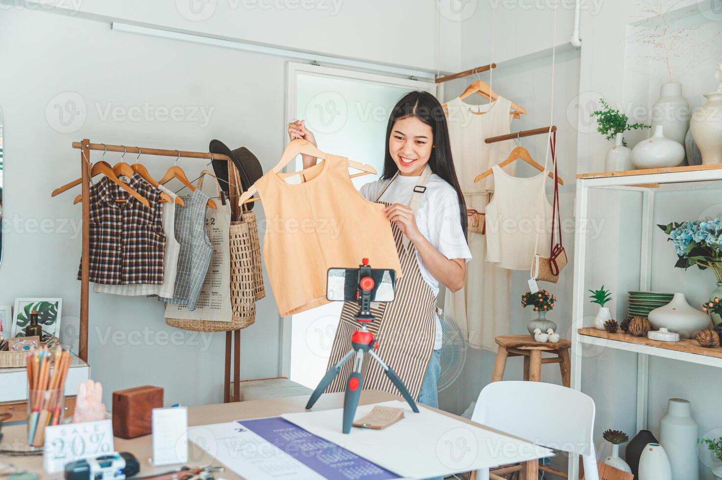 Small business owners are live streaming. Sell products to customers who come to see to buy and take orders. Check out the orders that customers order from online retailers - online shopping. photo