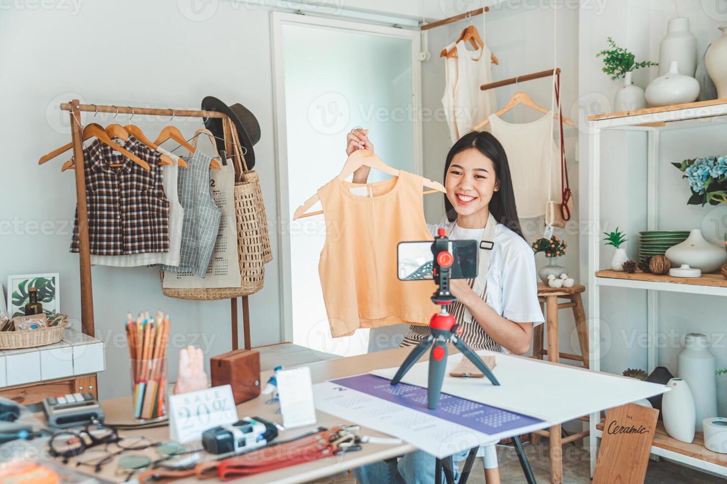 Small business owners are live streaming. Sell products to customers who come to see to buy and take orders. Check out the orders that customers order from online retailers - online shopping. photo