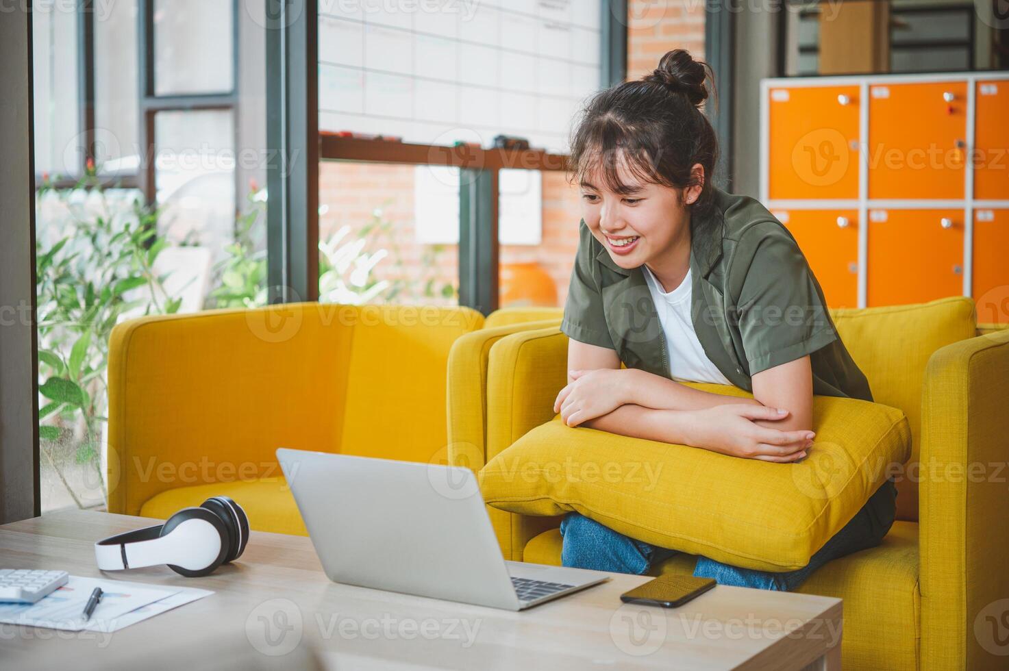 Teenage Asian are communicating through conferencing for online learning. In a conference call via apps. new normal concept photo