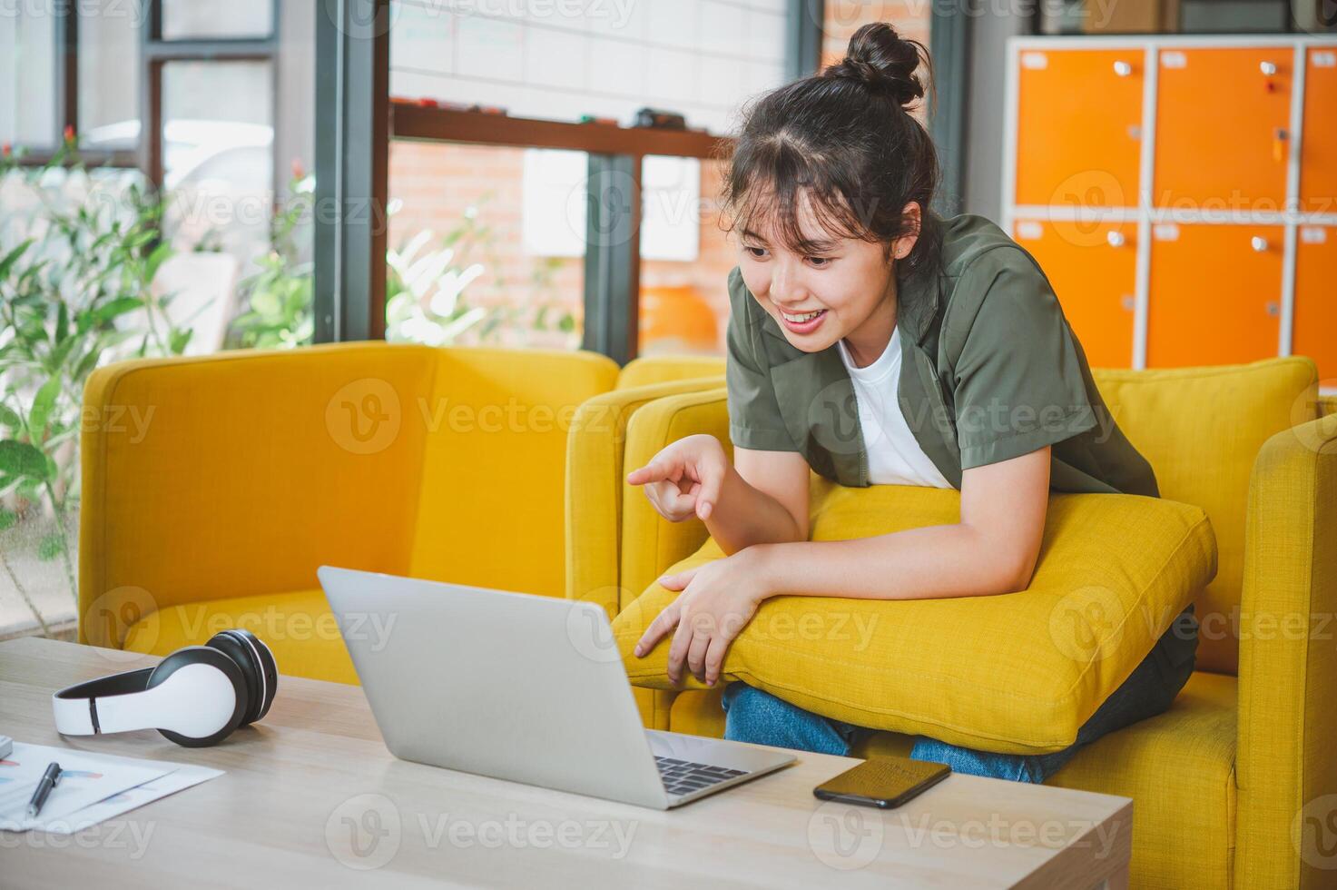 Teenage Asian are communicating through conferencing for online learning. In a conference call via apps. new normal concept photo