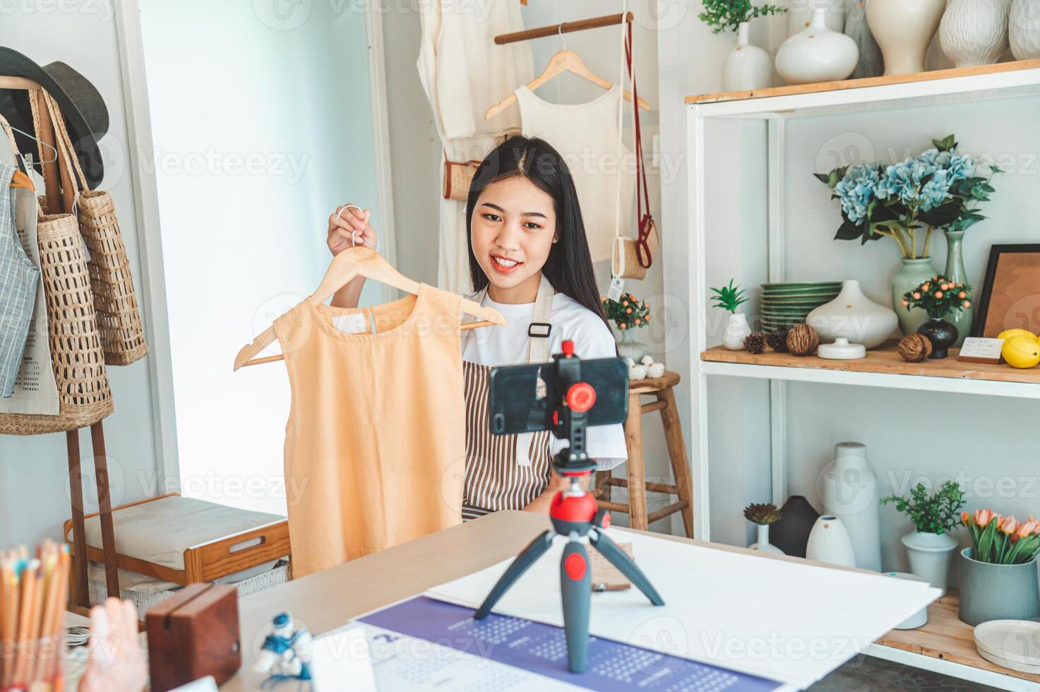Small business owners are live streaming. Sell products to customers who come to see to buy and take orders. Check out the orders that customers order from online retailers - online shopping. photo