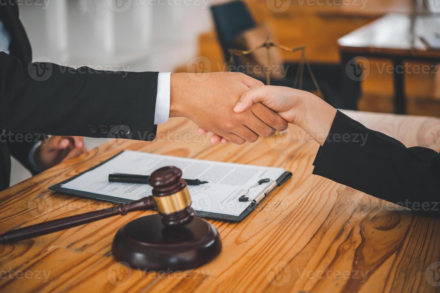 Law theme, mallet of the judge, law enforcement officers, evidence-based cases, and documents taken into account. photo