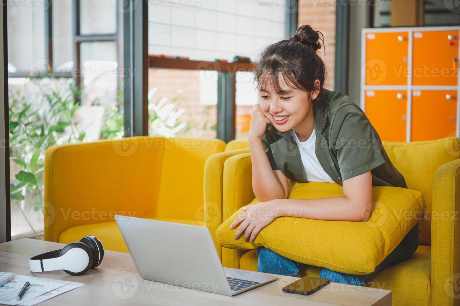 Teenage Asian are communicating through conferencing for online learning. In a conference call via apps. new normal concept photo