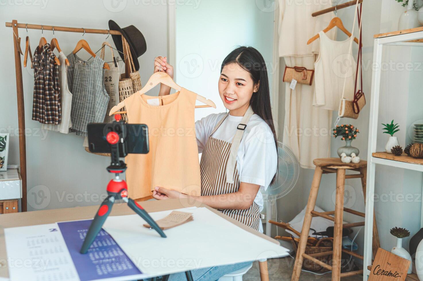 Small business owners are live streaming. Sell products to customers who come to see to buy and take orders. Check out the orders that customers order from online retailers - online shopping. photo