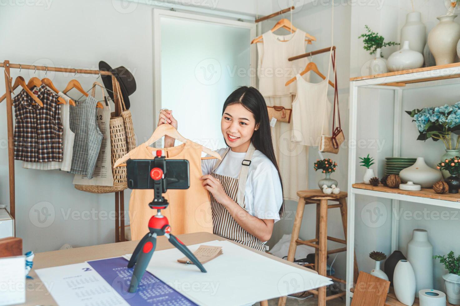 Small business owners are live streaming. Sell products to customers who come to see to buy and take orders. Check out the orders that customers order from online retailers - online shopping. photo