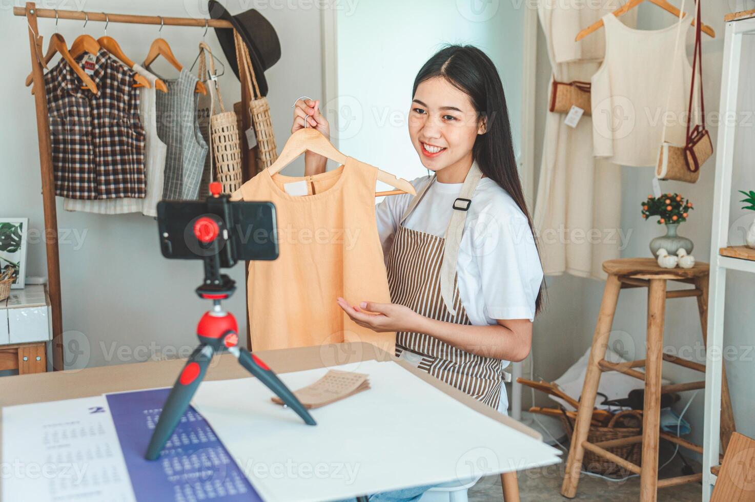 Small business owners are live streaming. Sell products to customers who come to see to buy and take orders. Check out the orders that customers order from online retailers - online shopping. photo