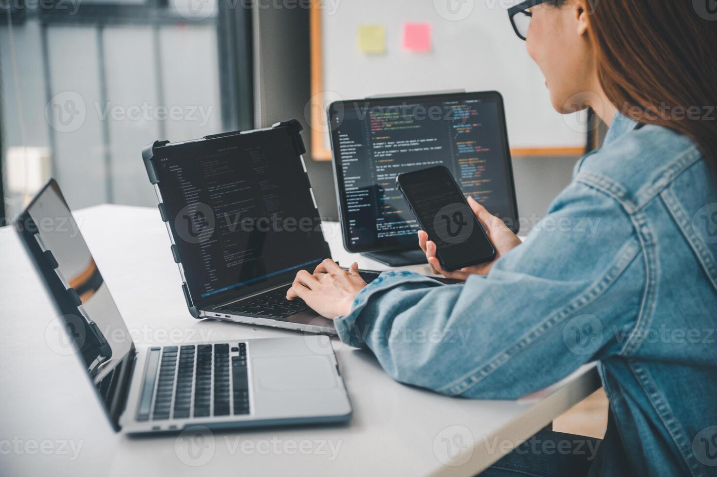 Female programmer working on coding, software development and web design.Concept technology development. photo