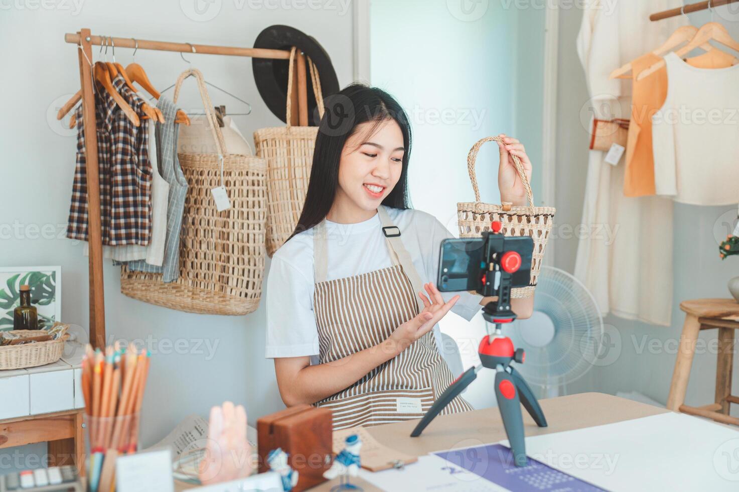 Small business owners are live streaming. Sell products to customers who come to see to buy and take orders. Check out the orders that customers order from online retailers - online shopping. photo