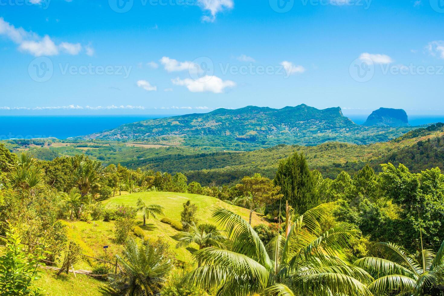 Aerial view of Mauritius island with mountains and beautiful blue lagoon photo