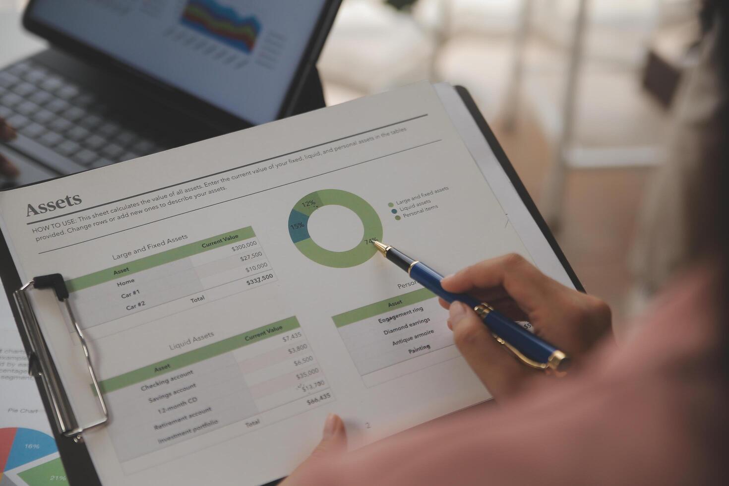 Close up of Business team analyzing income charts and graphs with modern laptop computer. Business analysis and strategy concept. photo