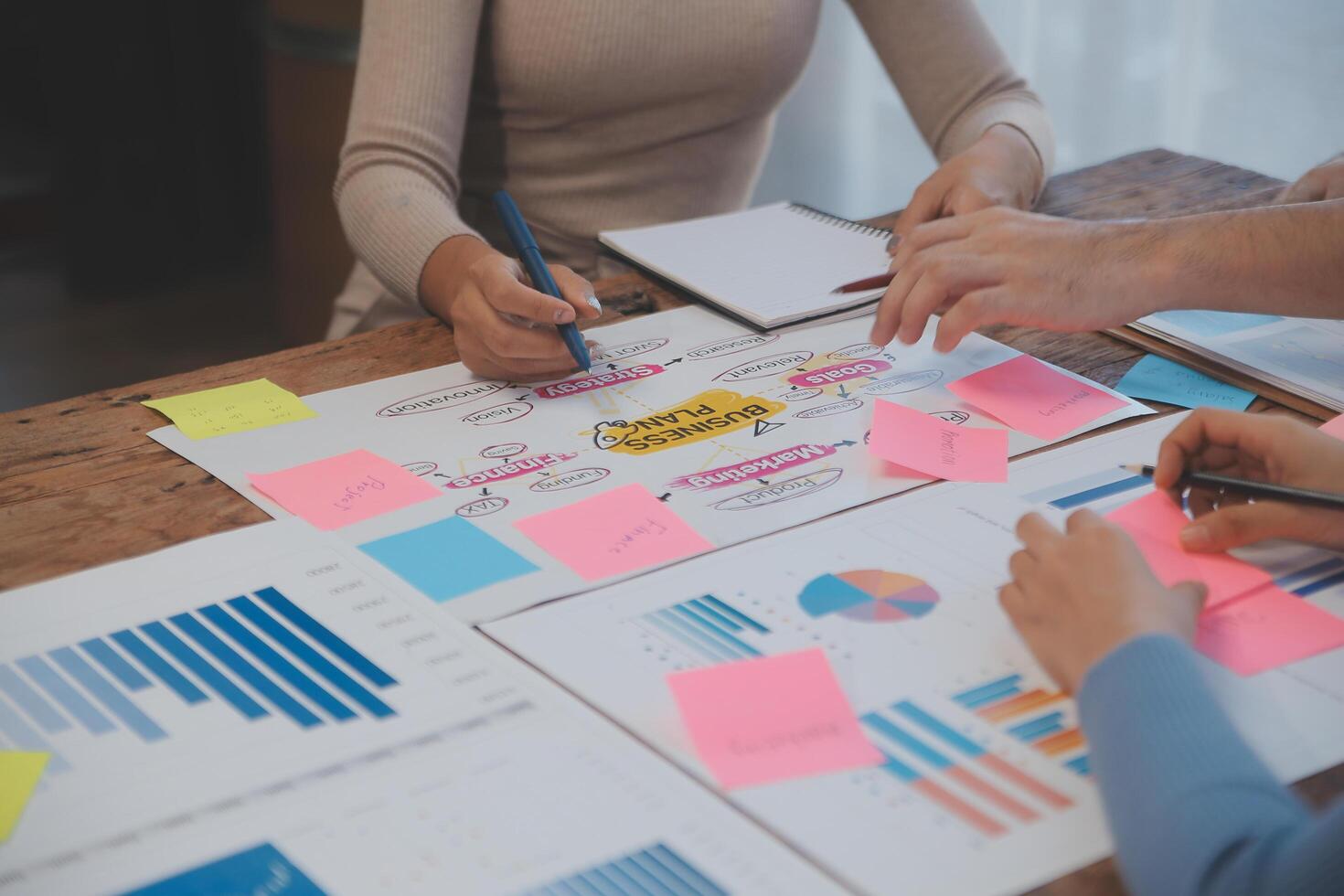 Team of business people working together in the meeting room office, teamwork background charts and graphs banner, double exposure successful teamwork,business planning concept. photo