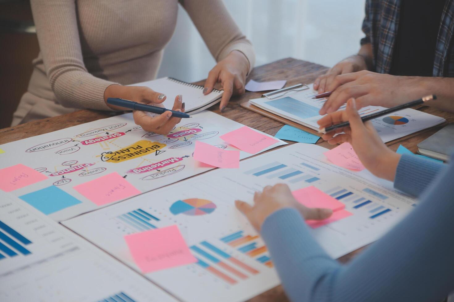 Team of business people working together in the meeting room office, teamwork background charts and graphs banner, double exposure successful teamwork,business planning concept. photo