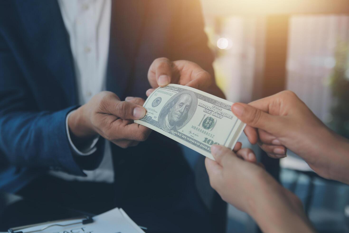 Real estate agent and customer signing contract to buy house, insurance or loan real estate.rent a house,get insurance or loan real estate or property. photo