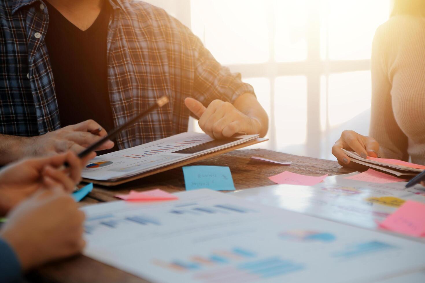 Team of business people working together in the meeting room office, teamwork background charts and graphs banner, double exposure successful teamwork,business planning concept. photo