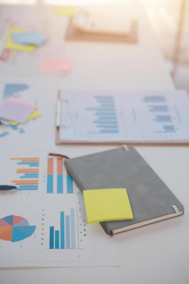 businessman working data document graph chart report marketing research development planning management strategy analysis financial accounting. Business office concept. photo