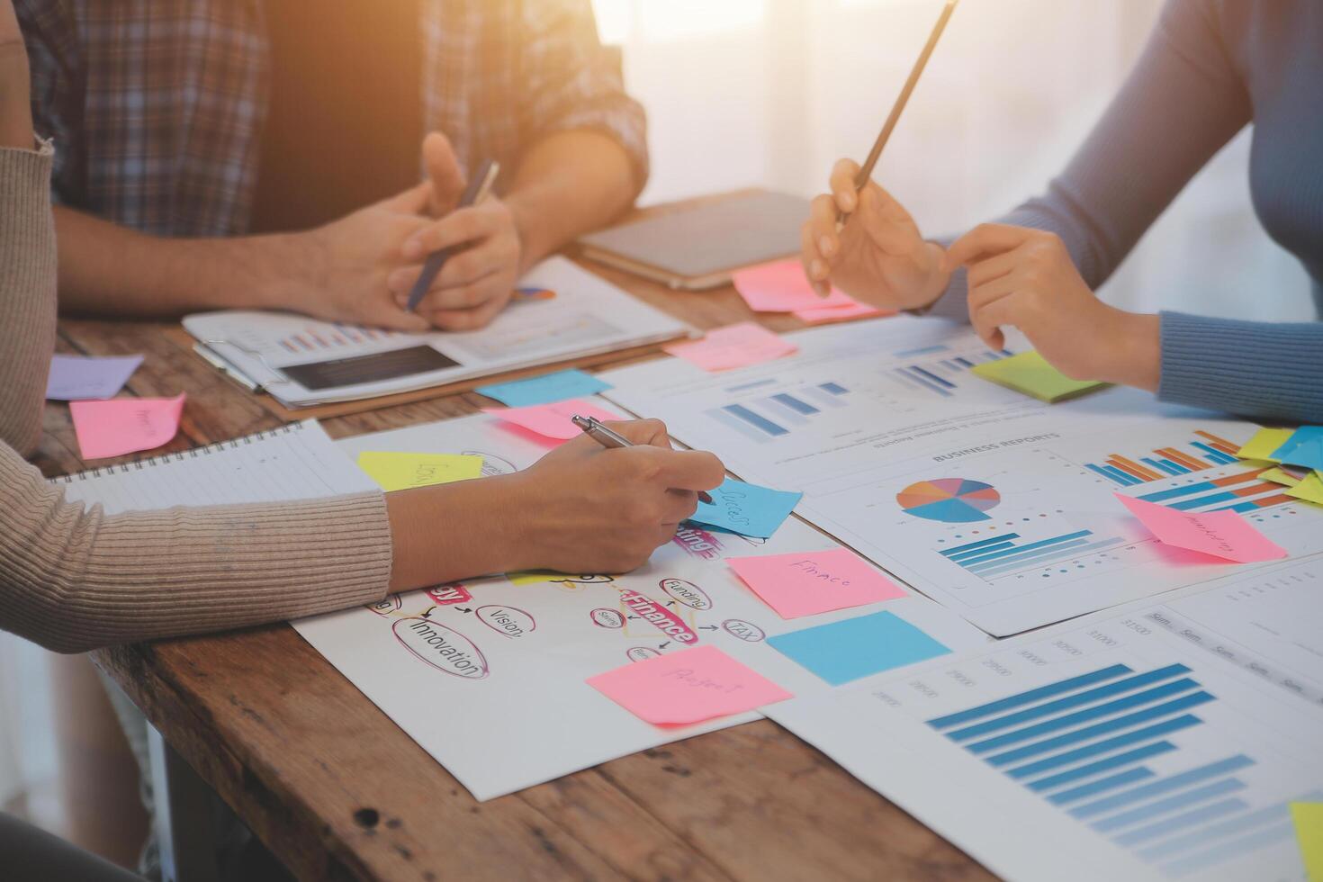 Team of business people working together in the meeting room office, teamwork background charts and graphs banner, double exposure successful teamwork,business planning concept. photo