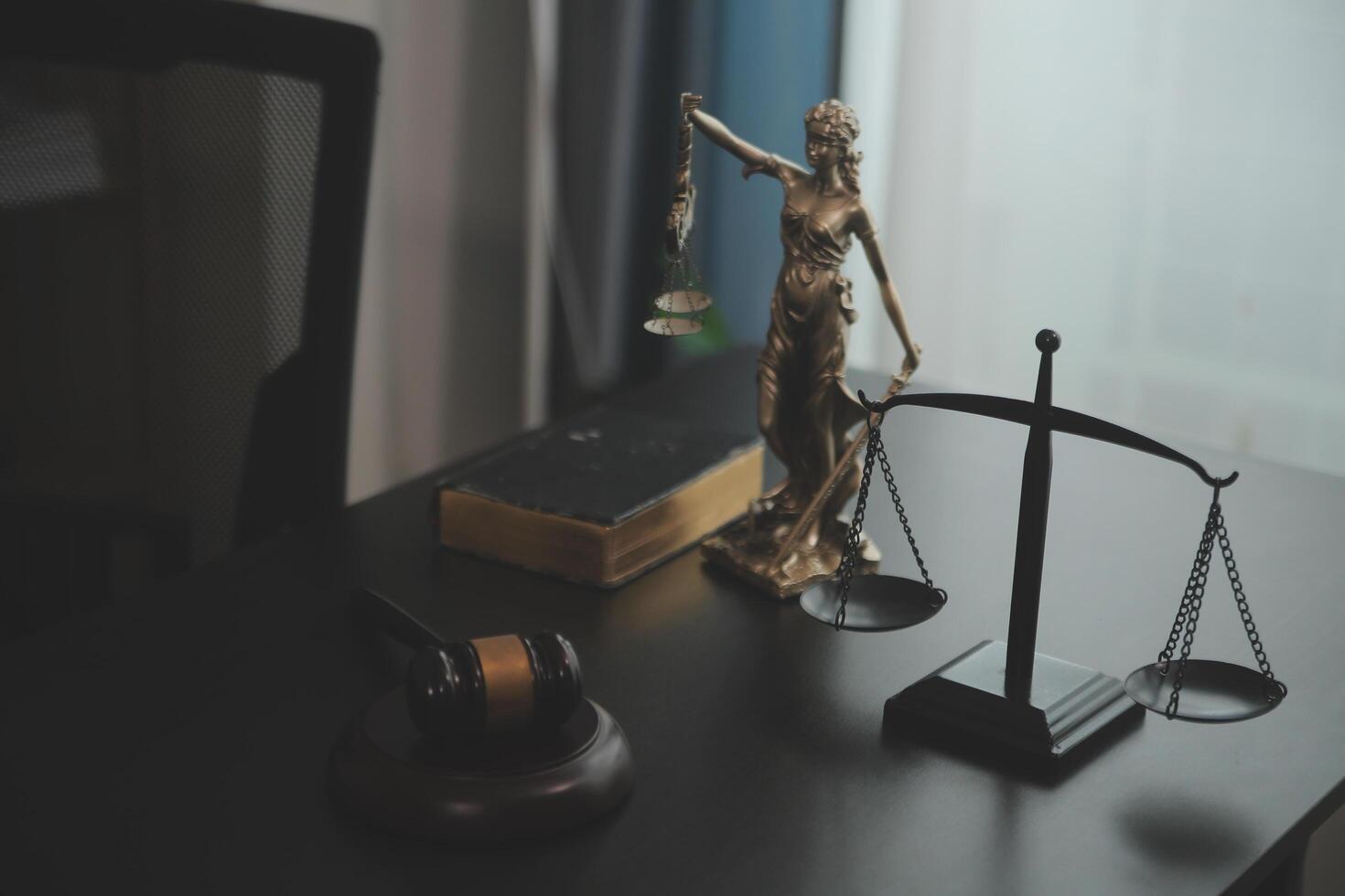 Law theme, gavel or mallet of the judge, lawyer enforcement officers, evidence-based cases taken into account in the court abount business, legislation. photo