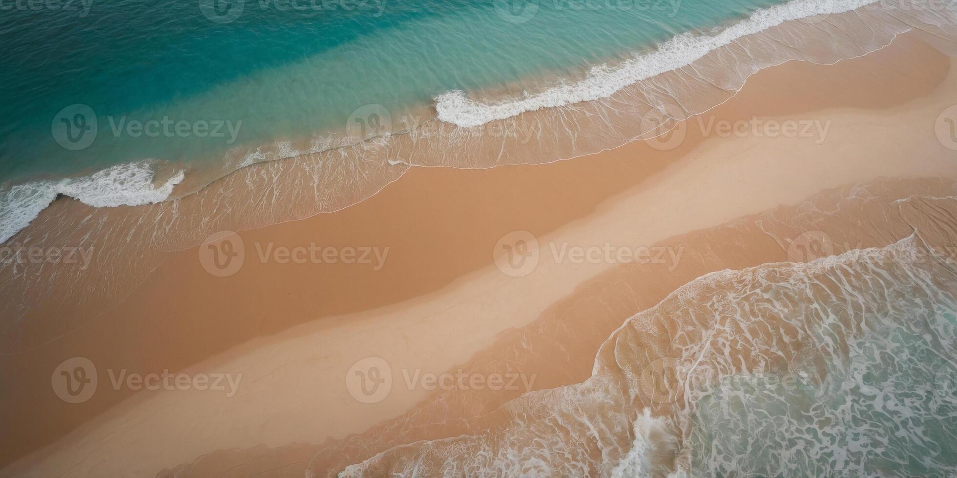 Sandy beach and turquoise water from above. photo