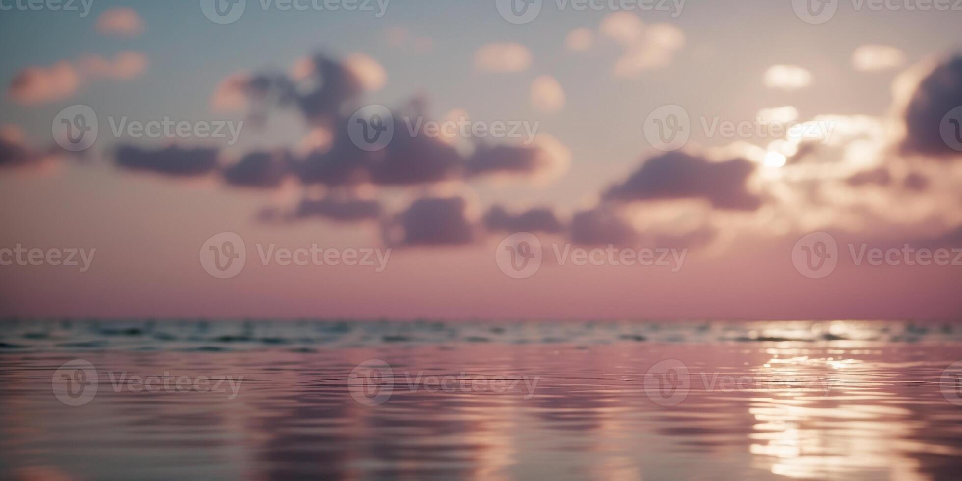 Close-up of a calm ocean surface with sparkling reflections and fluffy pink clouds in the sky The light creates a dreamy and serene atmosphere. photo