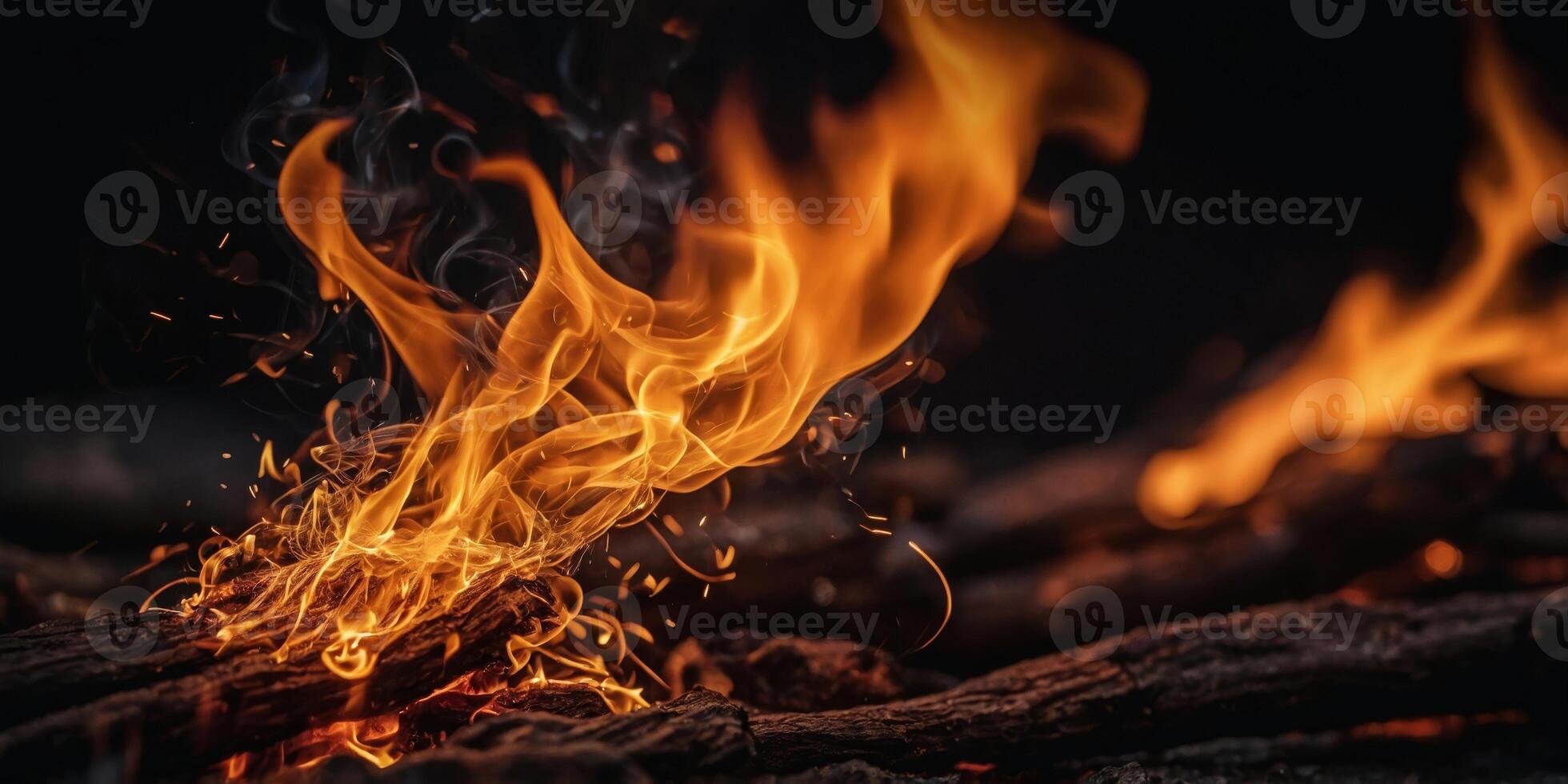 fire flames with sparks on a black background close up. photo