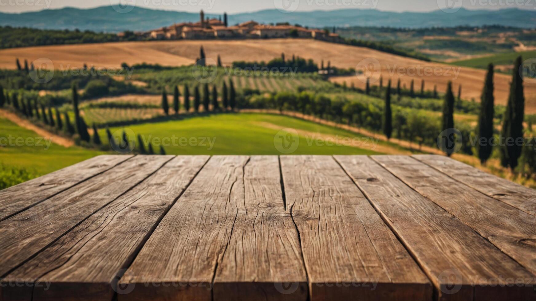 Empty wooden table for montage and display your products on the background of Tuscany landscape. photo