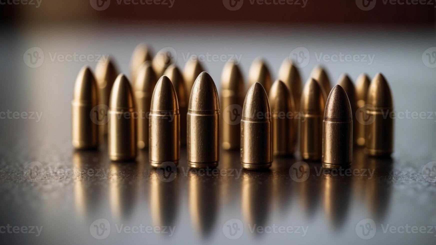 A row of bullets are lined up on a table. photo