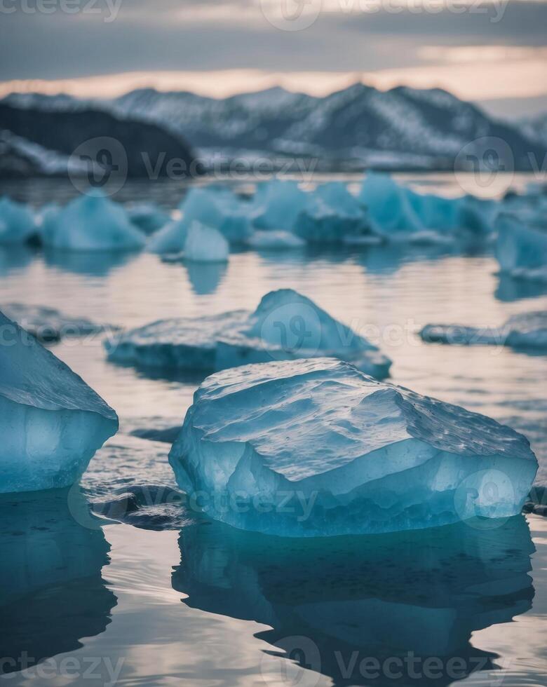 Blue icebergs floating in a glacial lagoon. photo