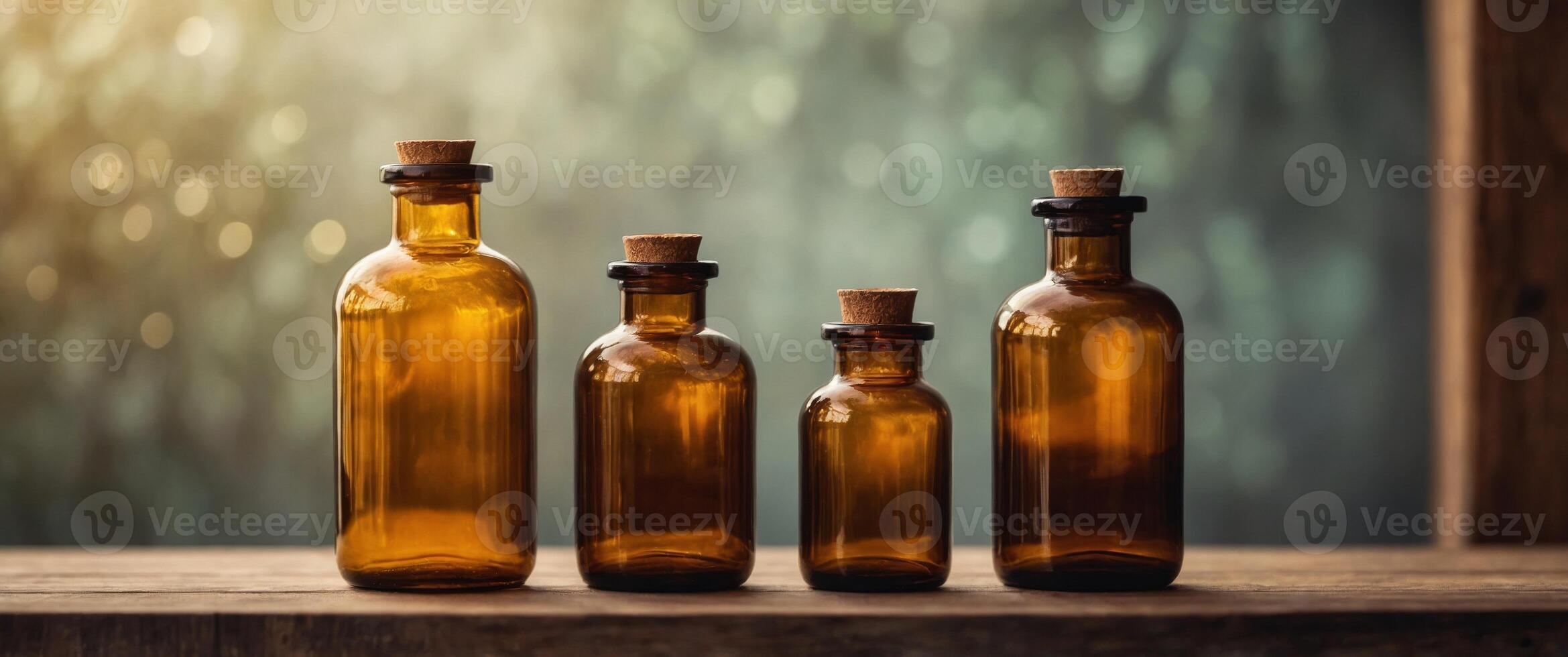 Row of amber glass bottles on wooden shelf. photo