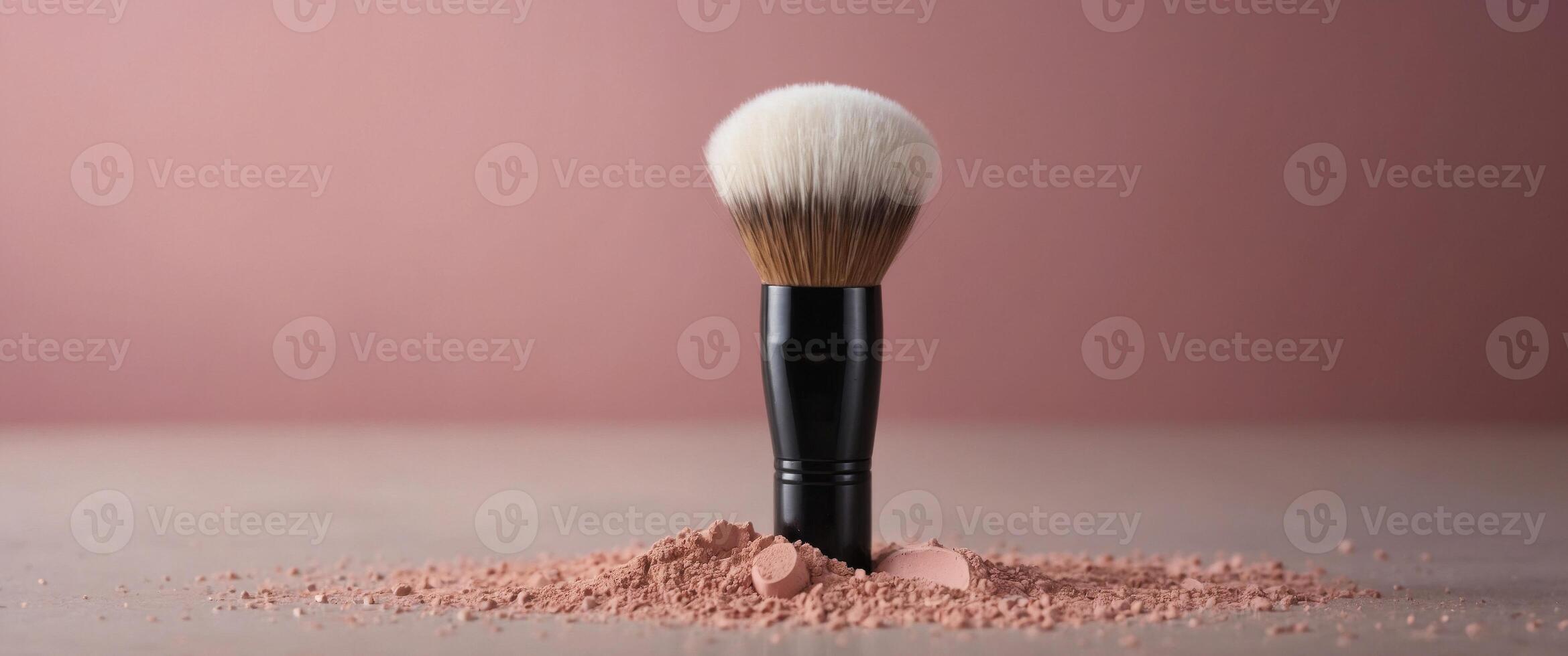 make up brush with powder pink background. photo