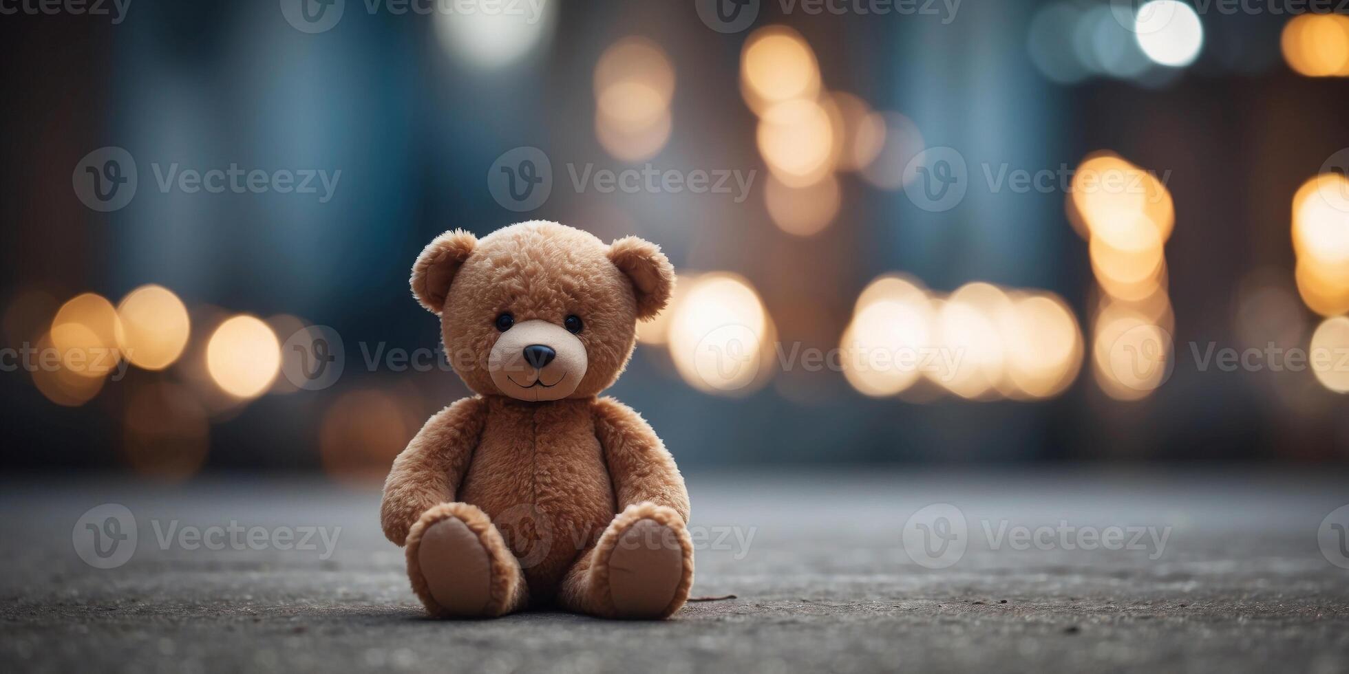 abandoned teddy bear on the background of building. photo