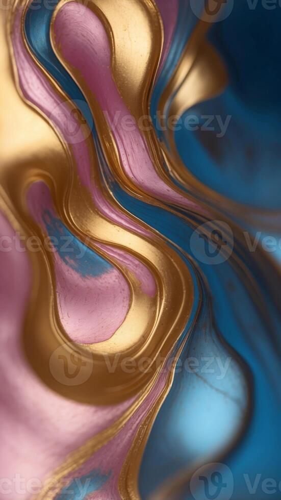 An gold and blue plate with a blue and pink swirl design. photo