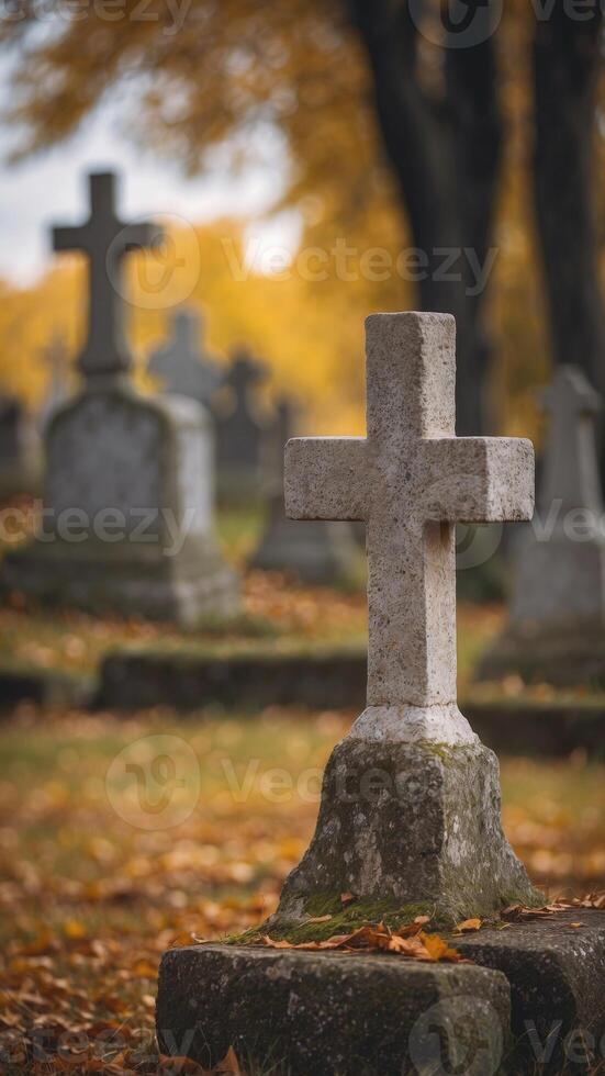 Weathered Ancient Stone Cross in a Peaceful Graveyard with Atmospheric Autumn Landscape. photo