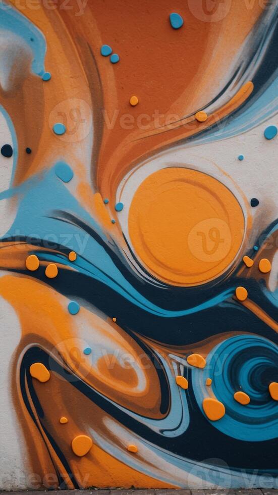 A colorful graffiti mural with a blue and orange swirl. photo