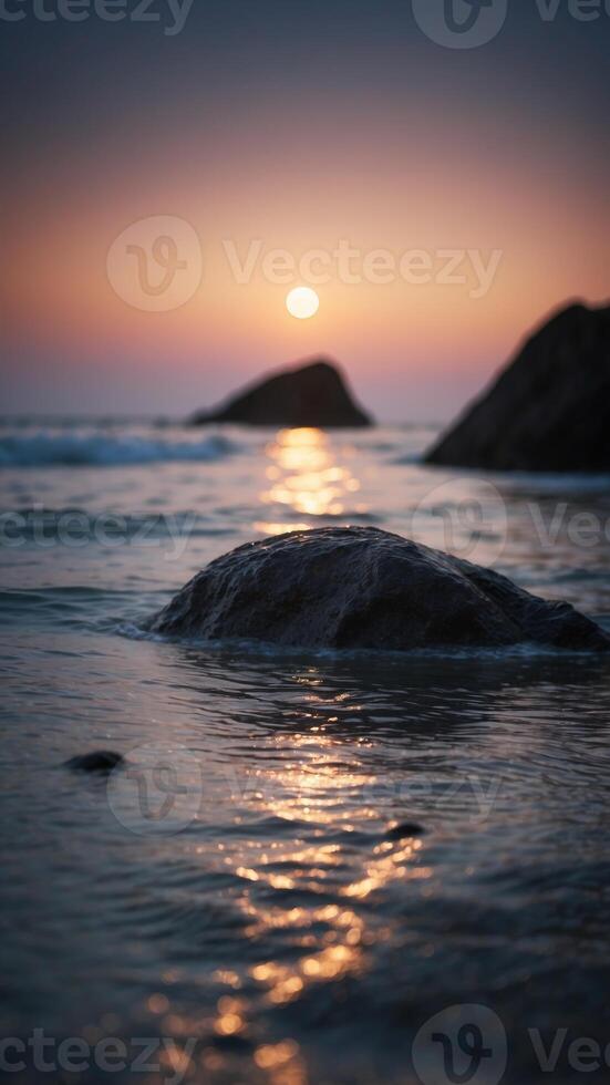 A beach with bioluminescent waves, where an empty rock sits under the moonlight. photo