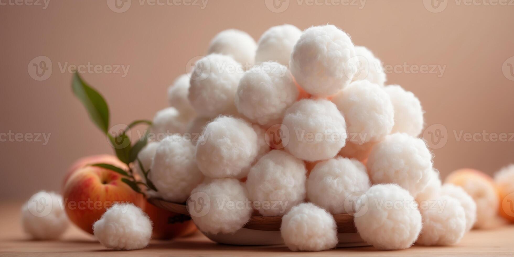 Fluffy White Cotton Ball on Peach Fuzz Color Background Minimal Modern Trendy Concept for Cleanliness and Purity. photo