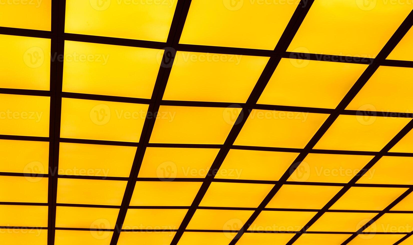 Black line on yellow isolate background, Metal grid painted in black isolated on yellow , Create visual impact with graphic patterns and ink splatters. Diagonal cells pattern. Seamless. photo