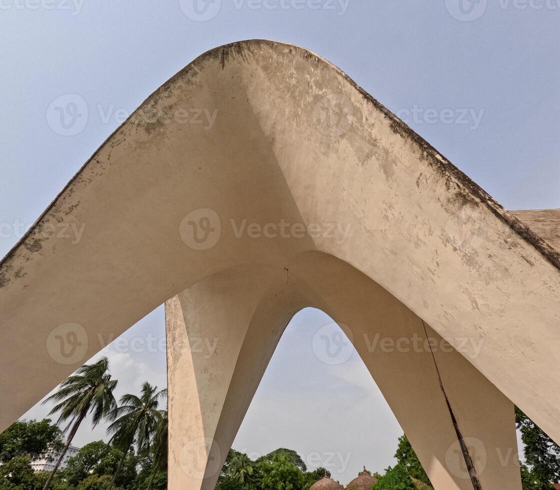 Shell structure of Mausoleum of three leaders at Shahbag Dhaka University area photo