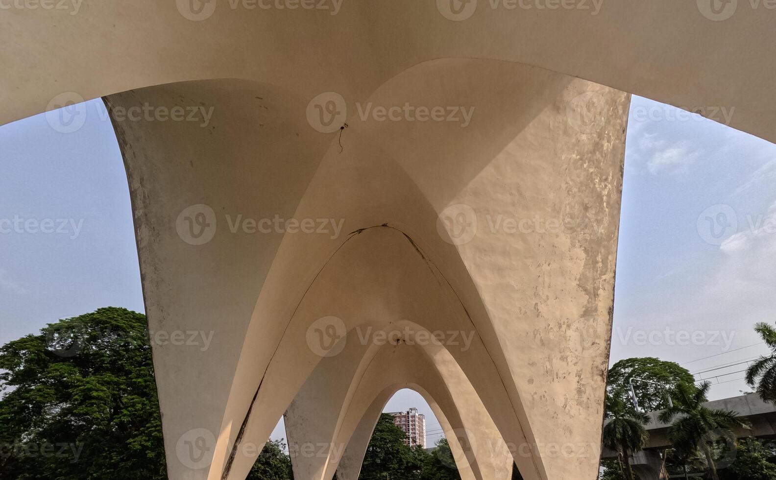 Shell structure of Mausoleum of three leaders at Shahbag Dhaka University area photo