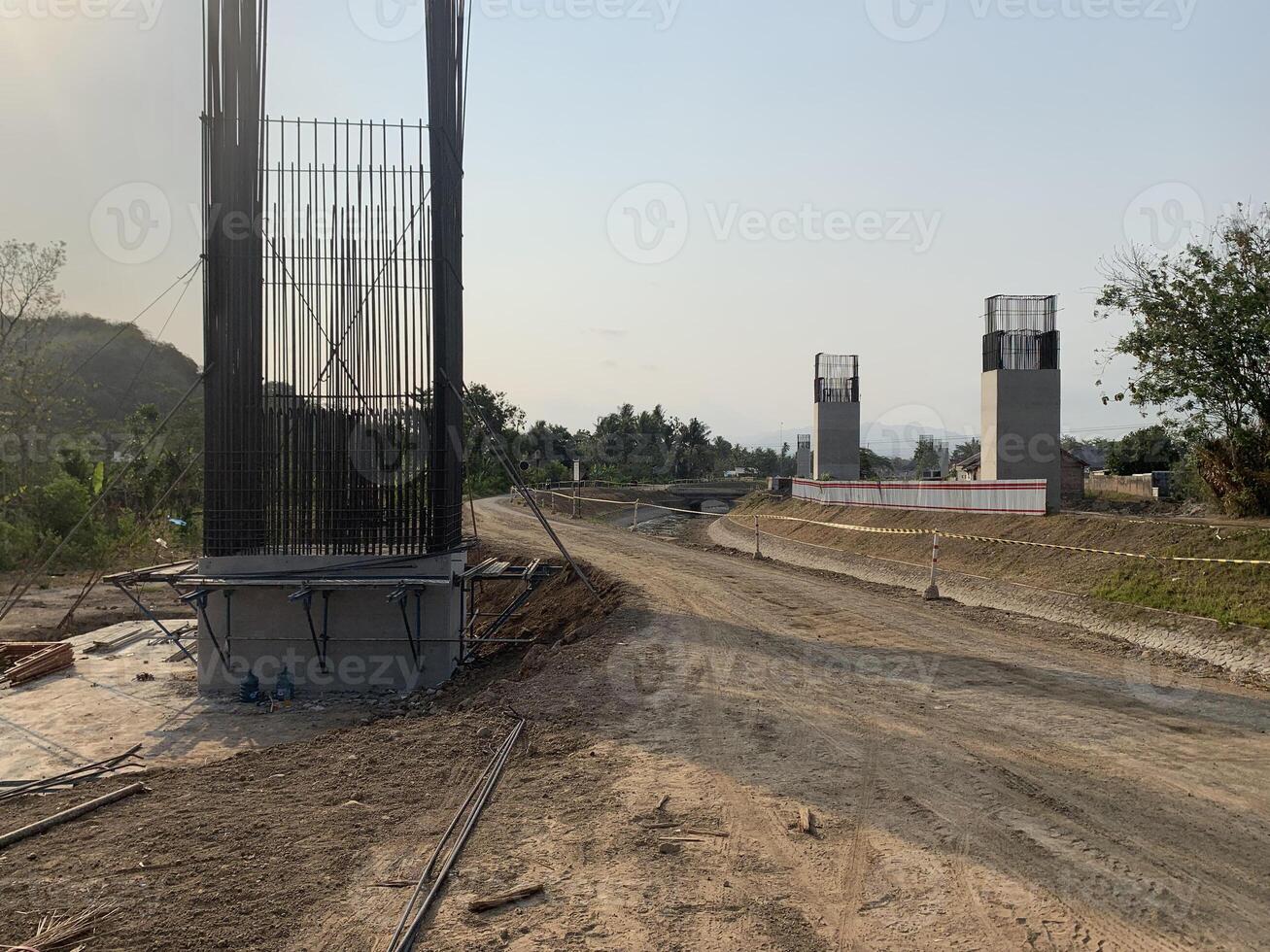 Highway construction hovering over a sewer, showcasing reinforced concrete work in progress. Ideal for infrastructure and engineering visuals. photo
