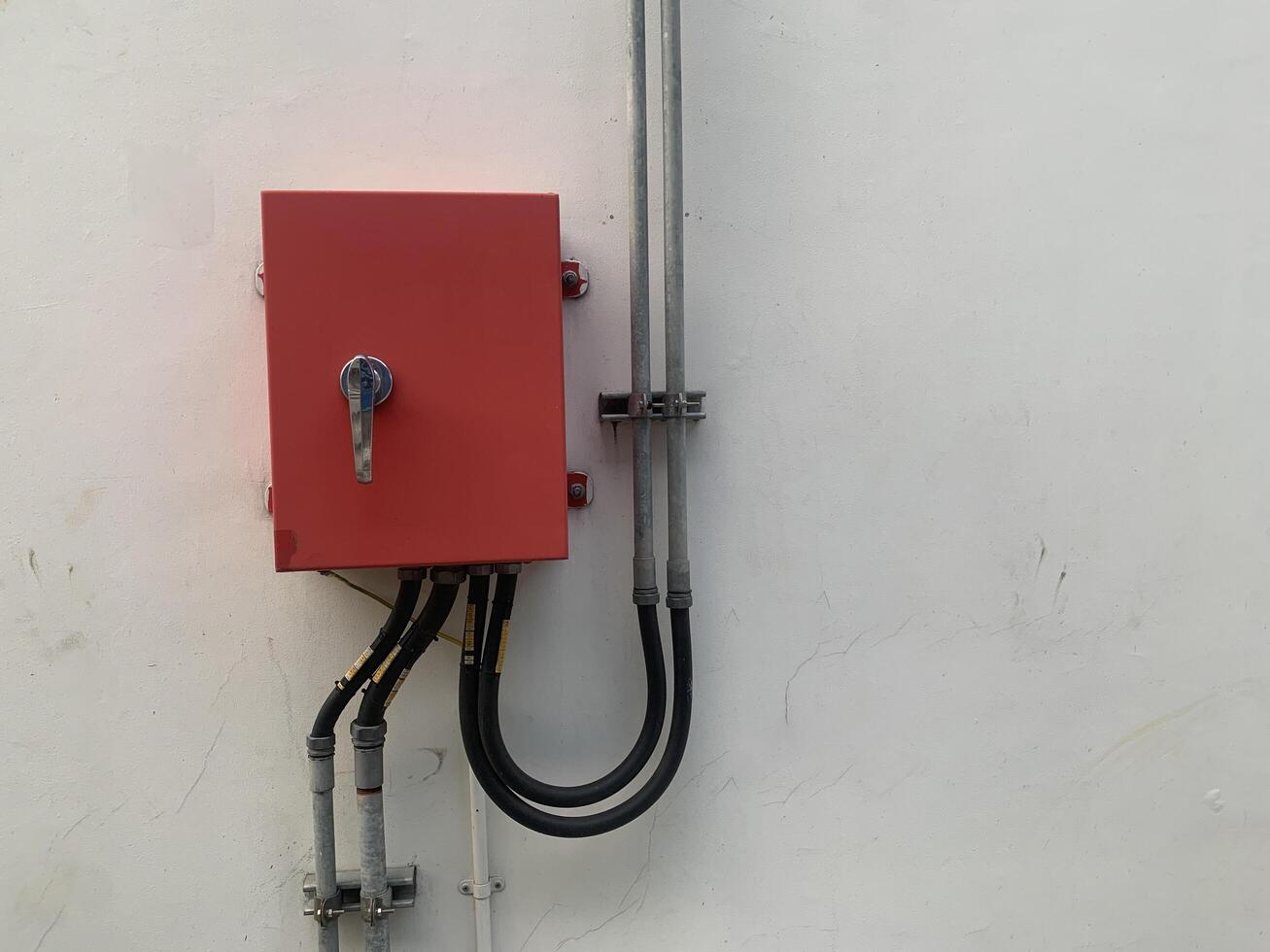 Electrical Panel of fire protection a White Wall photo